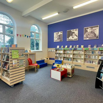 Children's area showing updated shelving, plus children's picture books in the middle