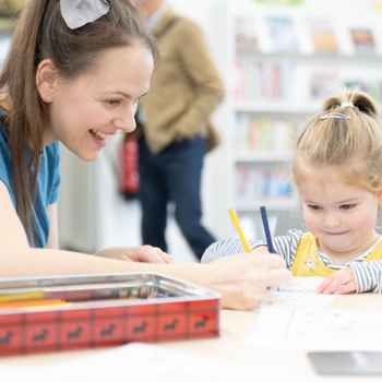 Woodthorpe reopening - a parent and child colour together