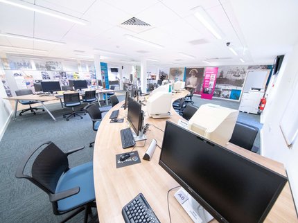 A room with computers set up on desks