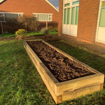 Green area, now with raised flower bed