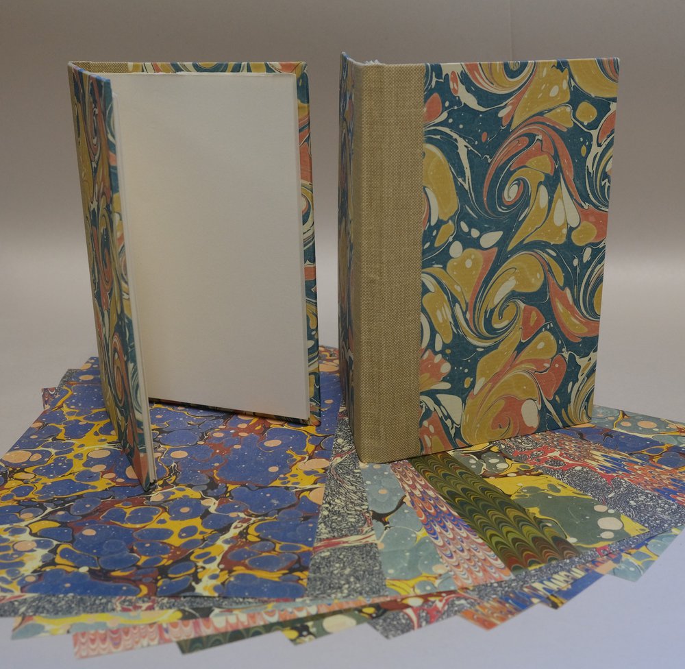 Two notebooks with marbled paper