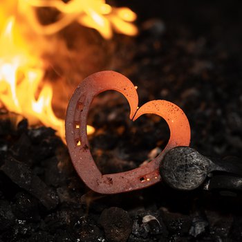 Photo of metal heart in furnace