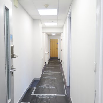 Interior of Hucknall Library - corridor leading to accessible customer toilet