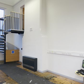 Interior of Hucknall Library - main library showing new help desk space