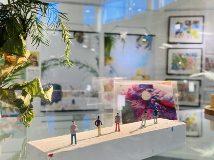 Small figurines in a glass cabinet