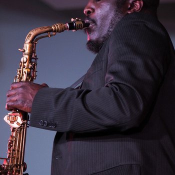 Photo of Tony Kofi playing the saxophone