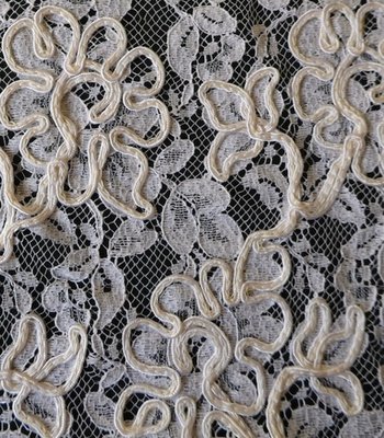 White lace on a black background