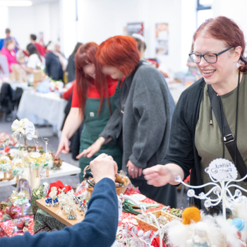 Customer purchasing from stall