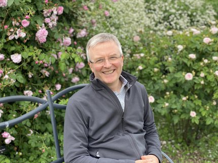 Photograph of Martin Stott - a white male with short, grey hair and glasses and a grey fleece top