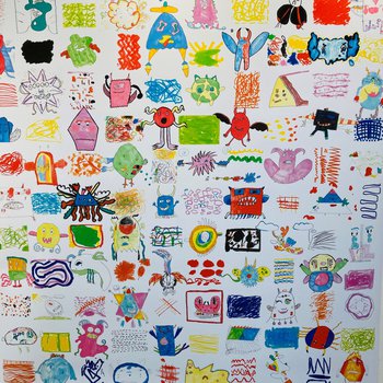 A photograph of a large poster filled with colourful imaginative drawings of monsters