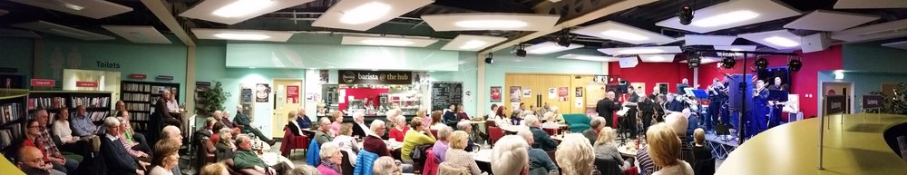 Panoramic photo of a jazz gig at Worksop Library