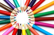 colouring crayons pointing inwards to make a circle