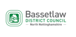 Green and grey text on white background Bassetlaw District Council Logo North Nottinghamshire