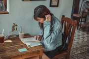 A girl reading in a cafe