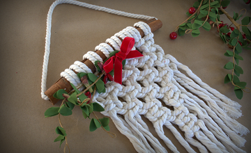 Macrame square with red bow