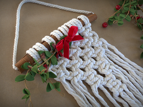 Macrame square with red bow
